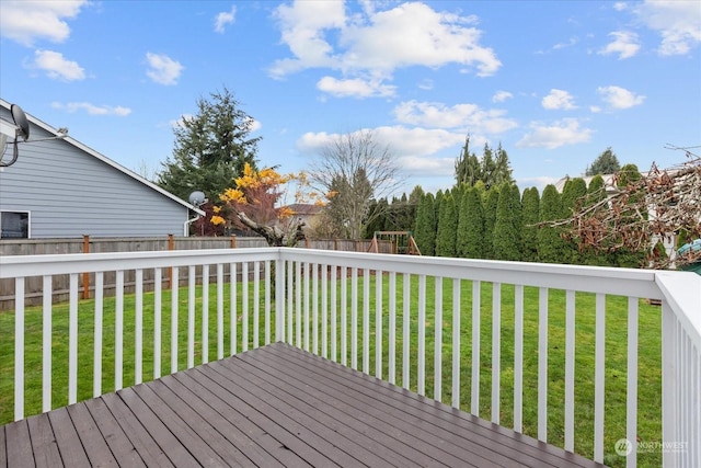 wooden deck with a yard