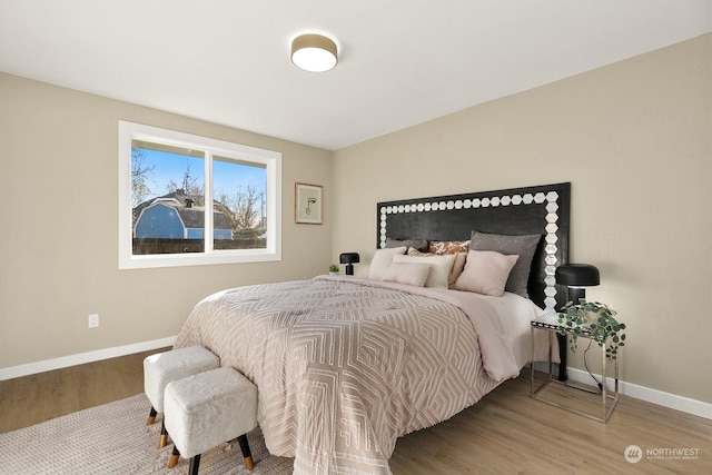 bedroom featuring wood-type flooring