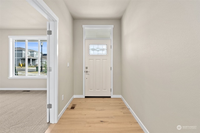 doorway featuring light wood-type flooring