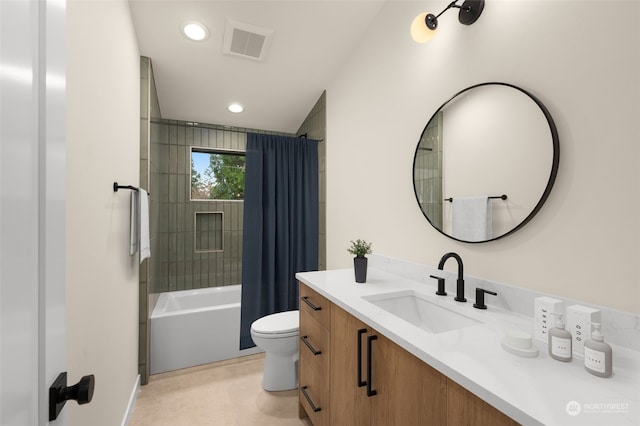 full bathroom featuring vanity, toilet, and shower / tub combo