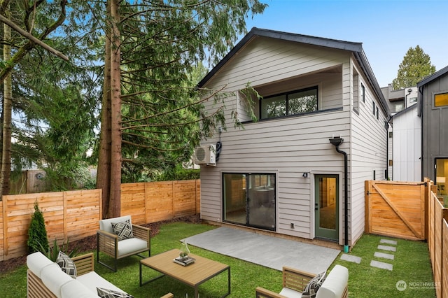 rear view of property featuring ac unit, an outdoor living space, a yard, and a patio