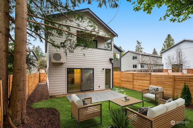 back of property with outdoor lounge area, a yard, a patio, and ac unit