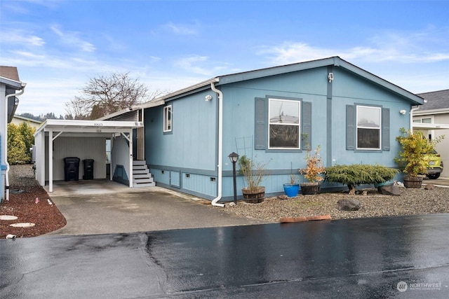 view of front of house featuring a carport