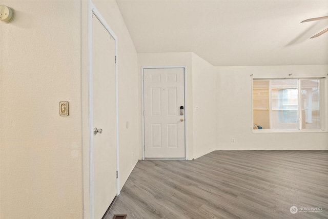 entrance foyer featuring ceiling fan and light hardwood / wood-style flooring