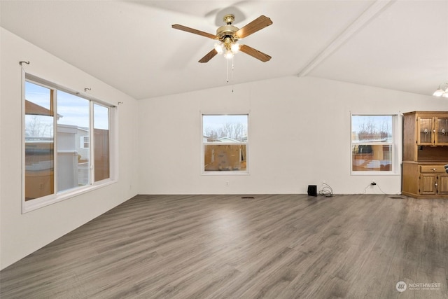 unfurnished living room with vaulted ceiling with beams, hardwood / wood-style flooring, and ceiling fan