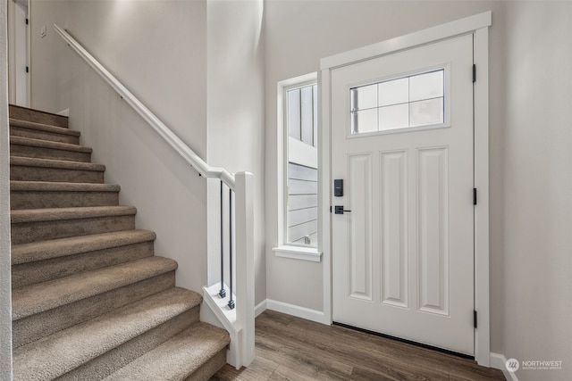 entrance foyer featuring hardwood / wood-style floors