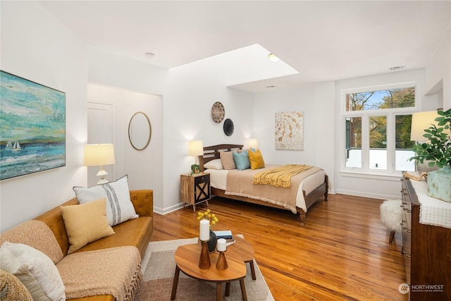 bedroom featuring wood-type flooring