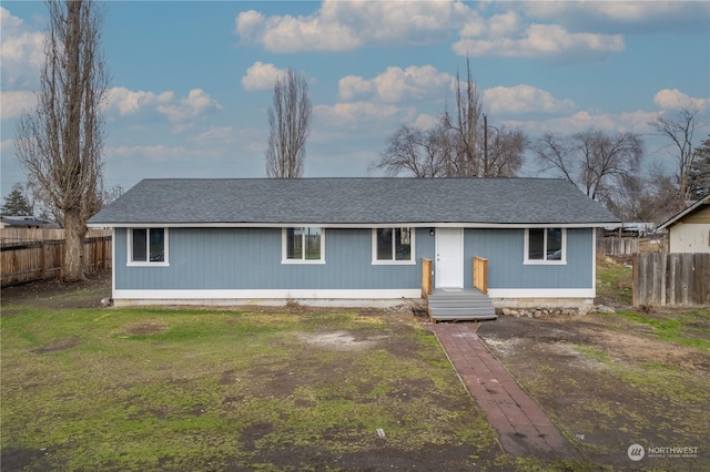 ranch-style house with a front yard