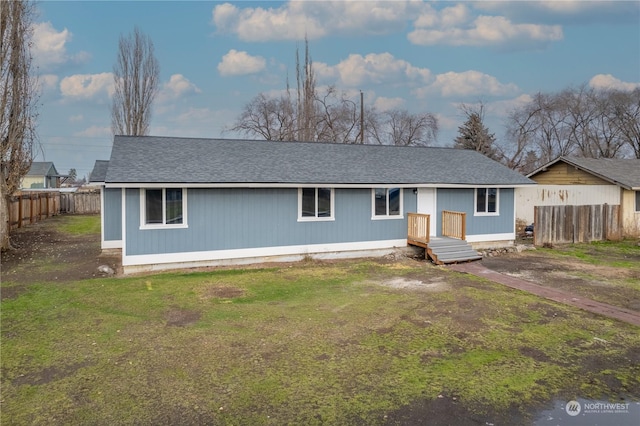 ranch-style home with a front yard