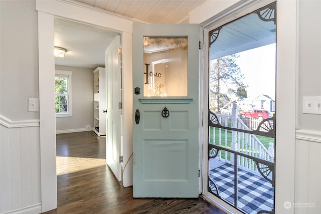 doorway featuring dark hardwood / wood-style floors