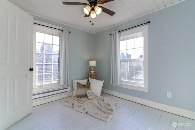 living area with light hardwood / wood-style floors, ceiling fan, and wood ceiling