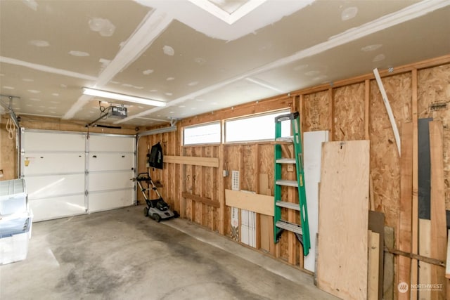 garage featuring a garage door opener