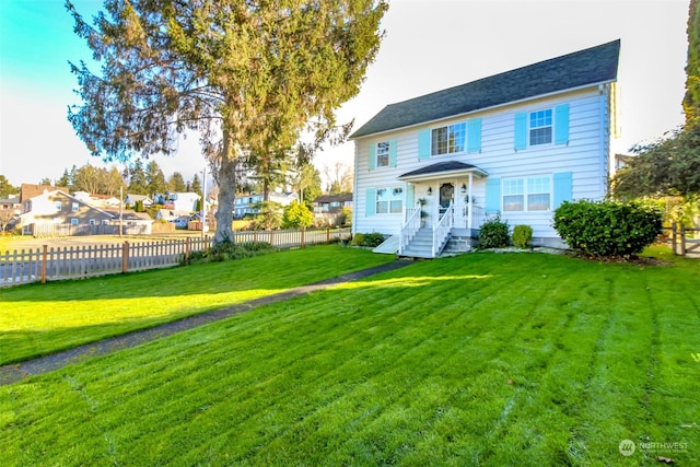 view of front of house featuring a front lawn