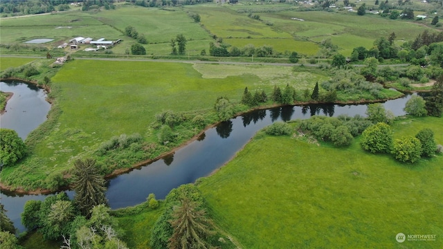 bird's eye view with a rural view and a water view