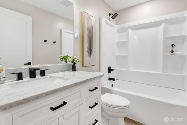 full bathroom featuring vanity, shower / bathtub combination, and toilet