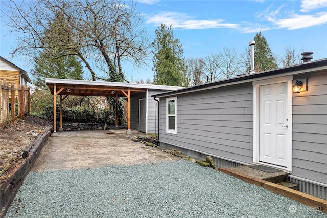 view of home's exterior with a carport