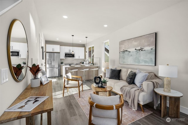 living room with hardwood / wood-style flooring