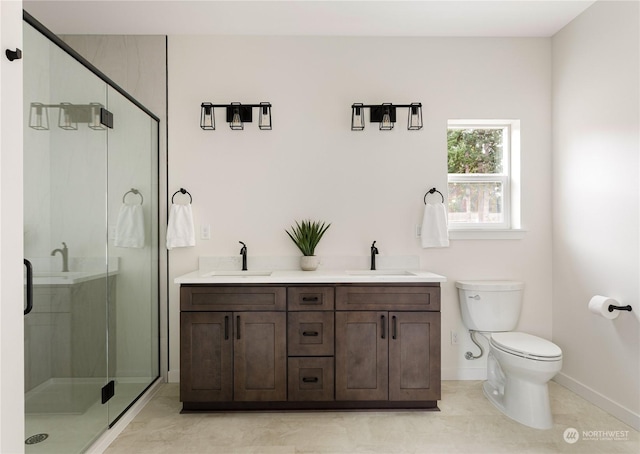 bathroom featuring vanity, toilet, and walk in shower