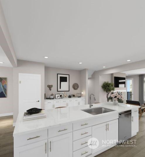 kitchen with white cabinetry, sink, light stone counters, stainless steel dishwasher, and dark hardwood / wood-style floors