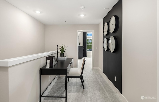 office area featuring light colored carpet