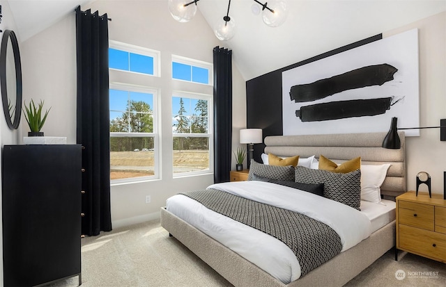 carpeted bedroom featuring vaulted ceiling