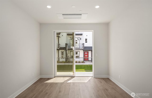 9014 NE 203rd Ln Unit B, Bothell, WA 98011 - empty room with wood finished floors, baseboards, and recessed lighting