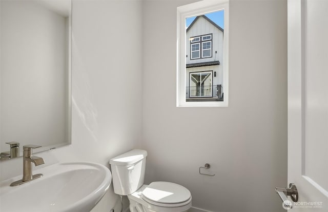 9014 NE 203rd Ln Unit B, Bothell, WA 98011 - bathroom with a sink, toilet, and baseboards