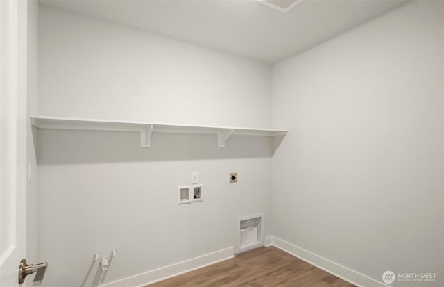9014 NE 203rd Ln Unit B, Bothell, WA 98011 - clothes washing area with gas dryer hookup, wood finished floors, hookup for an electric dryer, baseboards, and washer hookup