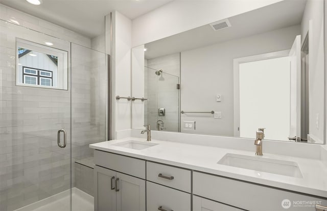 9014 NE 203rd Ln Unit B, Bothell, WA 98011 - bathroom featuring a shower stall, double vanity, and recessed lighting