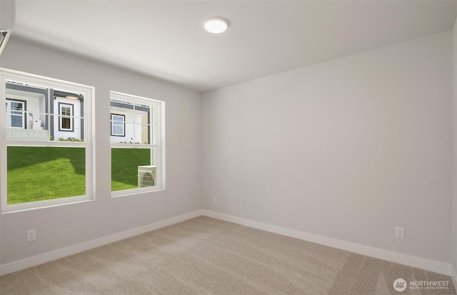 9014 NE 203rd Ln Unit C, Bothell, WA 98011 - spare room with carpet flooring and baseboards