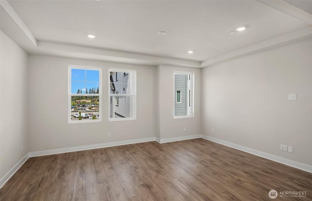 9014 NE 203rd Ln Unit C, Bothell, WA 98011 - spare room with wood finished floors, recessed lighting, and baseboards