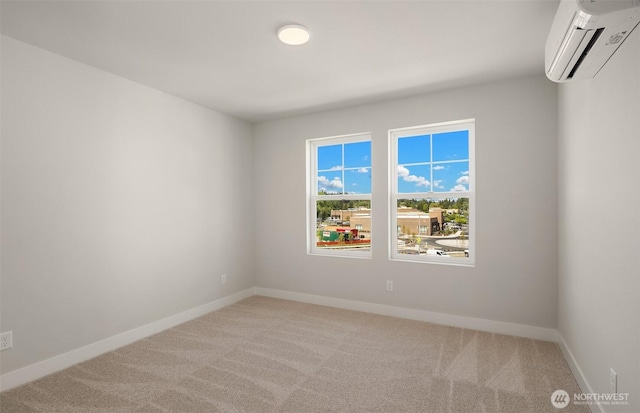 9014 NE 203rd Ln Unit C, Bothell, WA 98011 - spare room with a wall mounted air conditioner, light carpet, and baseboards