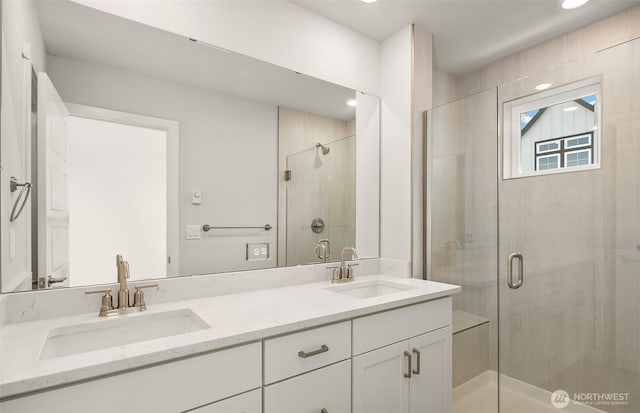 9014 NE 203rd Ln Unit C, Bothell, WA 98011 - full bathroom featuring a shower stall, double vanity, and recessed lighting