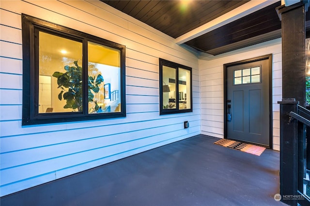 property entrance with covered porch