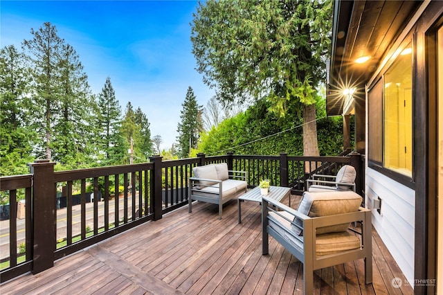 wooden deck with outdoor lounge area