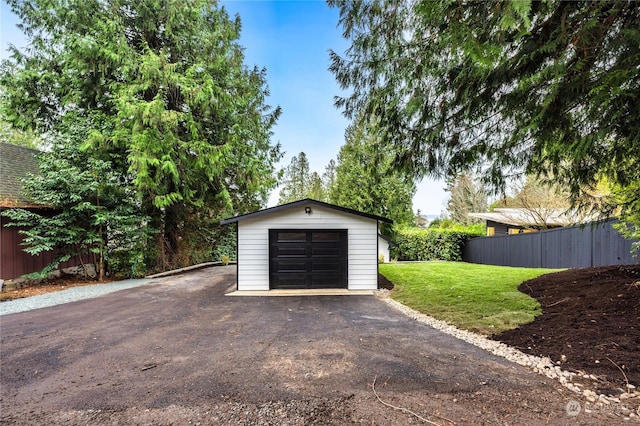 garage with a yard