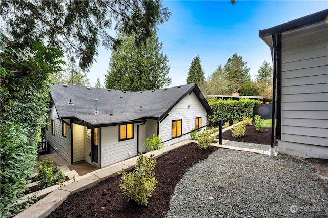 rear view of property with a patio