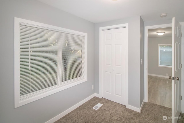 interior space featuring carpet flooring