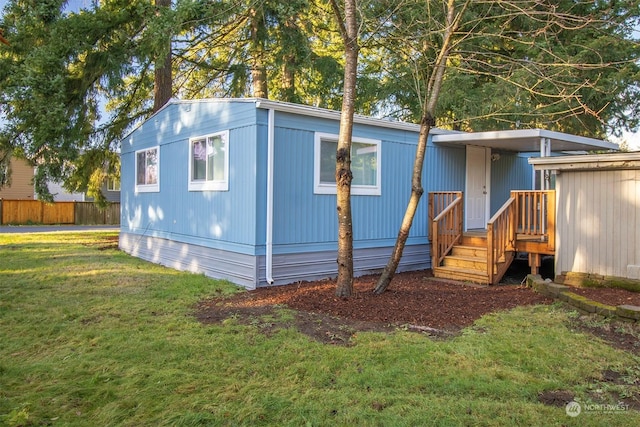 view of outdoor structure featuring a yard