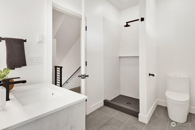 205 Riverwalk Dr, Lynden, WA 98264 - bathroom featuring a walk in shower, tile patterned flooring, and vanity