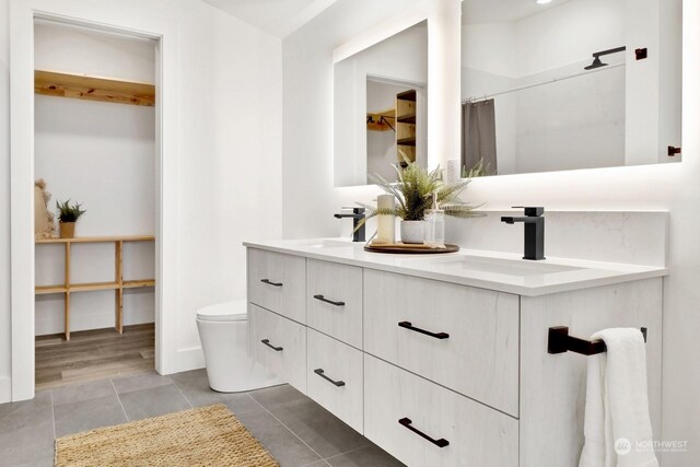 205 Riverwalk Dr, Lynden, WA 98264 - bathroom featuring double vanity and tile patterned floors