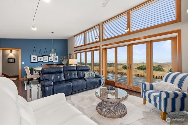 living room with a high ceiling