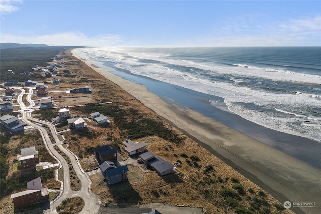 aerial view featuring a beach view and a water view