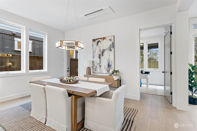 dining area featuring light hardwood / wood-style flooring