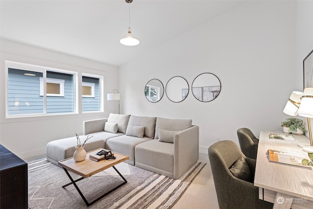 living room with lofted ceiling