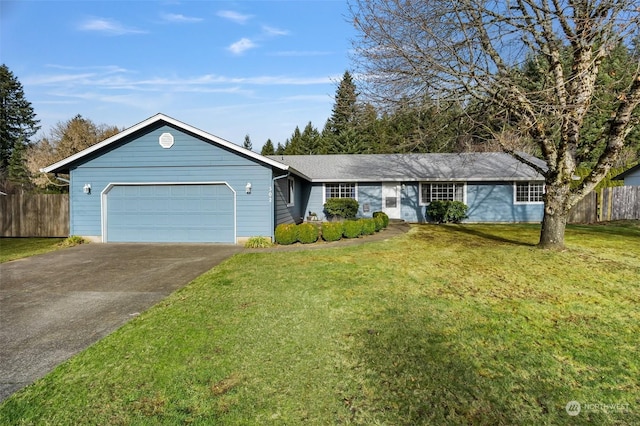 ranch-style home featuring a garage and a front lawn