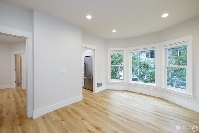 empty room featuring light hardwood / wood-style floors