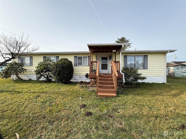 view of front of home featuring a front lawn