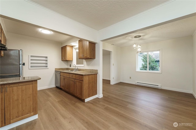 kitchen with hanging light fixtures, stainless steel appliances, light wood-type flooring, and a baseboard heating unit