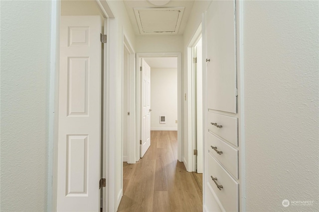 hallway featuring light hardwood / wood-style floors